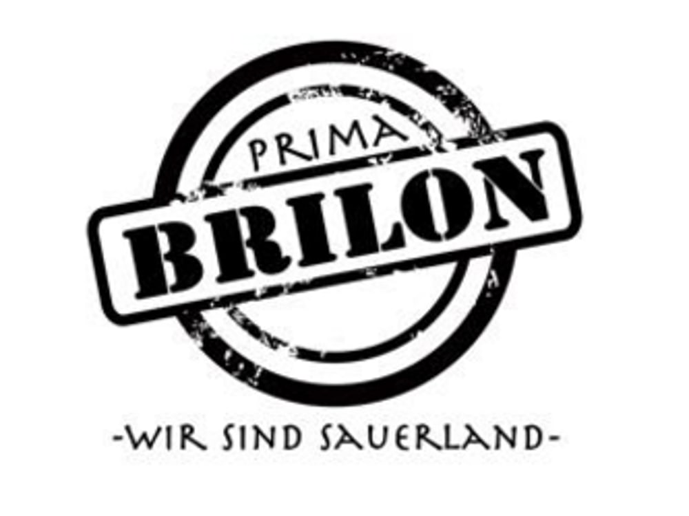 Stempel-Logo "PRIMA BRILON" mit Text "-WIR SIND SAUERLAND-" darunter.