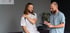 Man with shoulder pain assessed by medical professional for rehab
