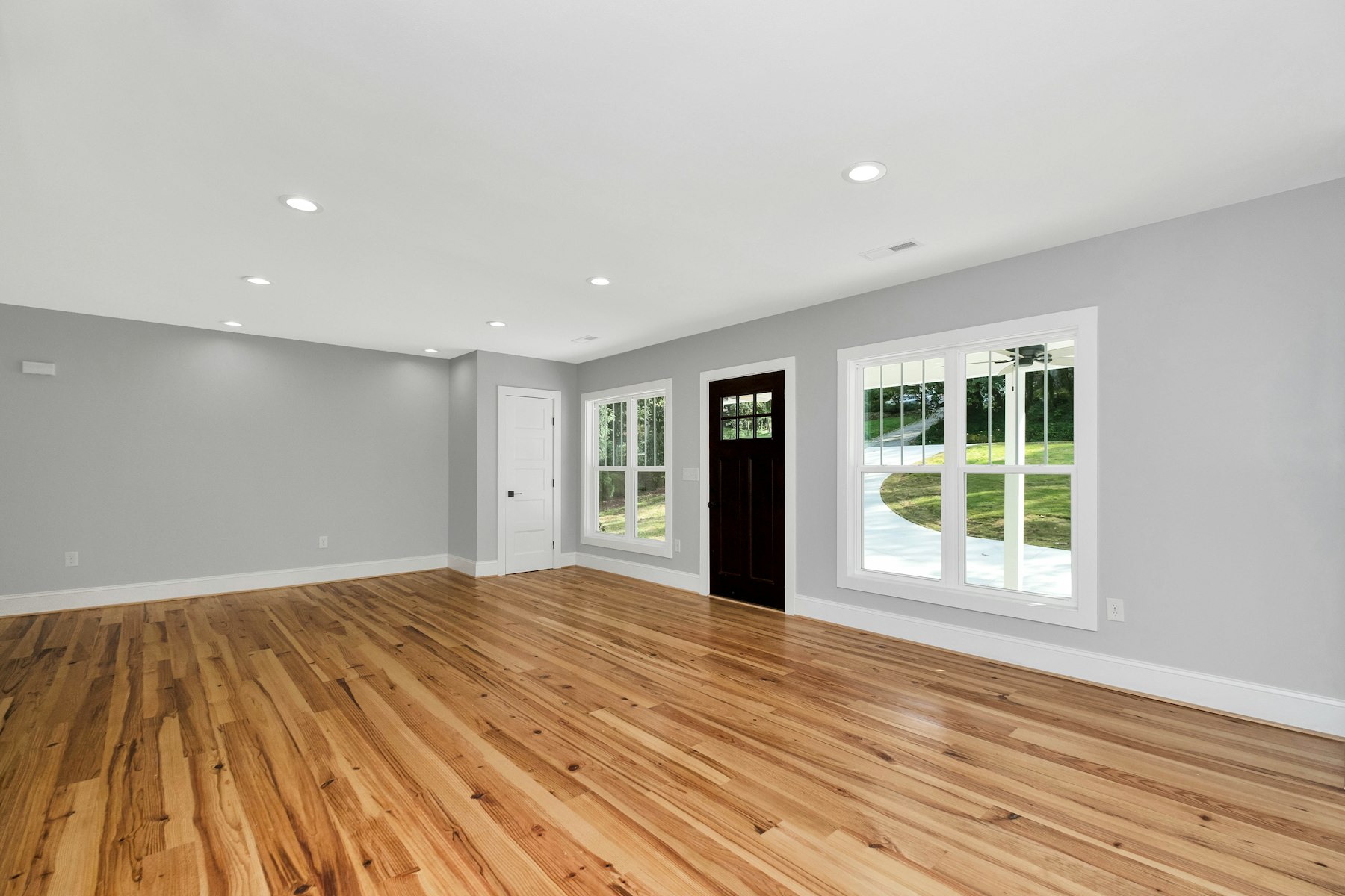 Freshly installed hardwood floor in an empty Santa Clara room