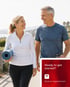 An active couple walks together, thriving after low testosterone care.