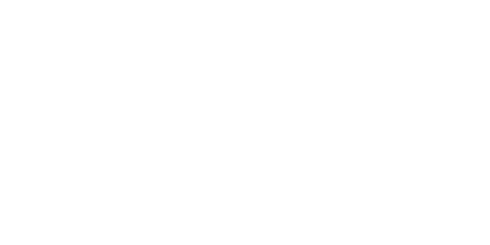 White tree with a monkey hanging from a branch, next to the word "Talbaum" on a dark green background.