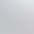 Stethoskop auf einem Schreibtisch, unscharfer Arzt tippt auf Laptop im Hintergrund - Software-KRITIS Notfall- und Krisenmanager (NKM®).