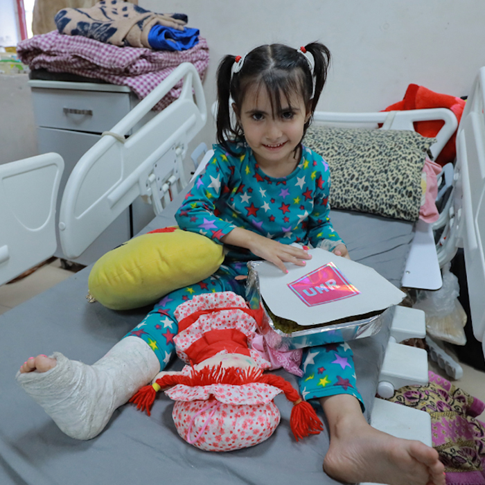 charity workers distributing aid packages to families in need, professional photography