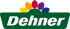 Dehner Logo mit weißem Schriftzug "Dehner" auf grünem Hintergrund und bunten Blütenblättern darüber.