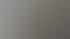 Modernes, dunkles TV-Möbel mit geschwungenen Linien und integrierter LED-Beleuchtung in einem Wohnzimmer.