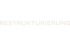 Beiger Text "RESTRUKTURIERUNG" auf dunkelgrauem Hintergrund.
