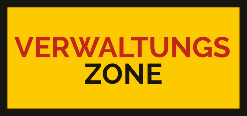 Gelbes Schild mit schwarzem Rahmen, rotem Text "VERWALTUNGS" und schwarzem Text "ZONE".