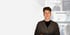 Junger Mann mit brauner Strickjacke vor einer Collage aus Webseiten mit Personen.