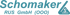 Schomaker RUS GmbH (OOO) Logo in Türkis mit einem stilisierten blauen S in einer dreieckigen Form.