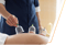 Practitioner applies cupping therapy to a person's back