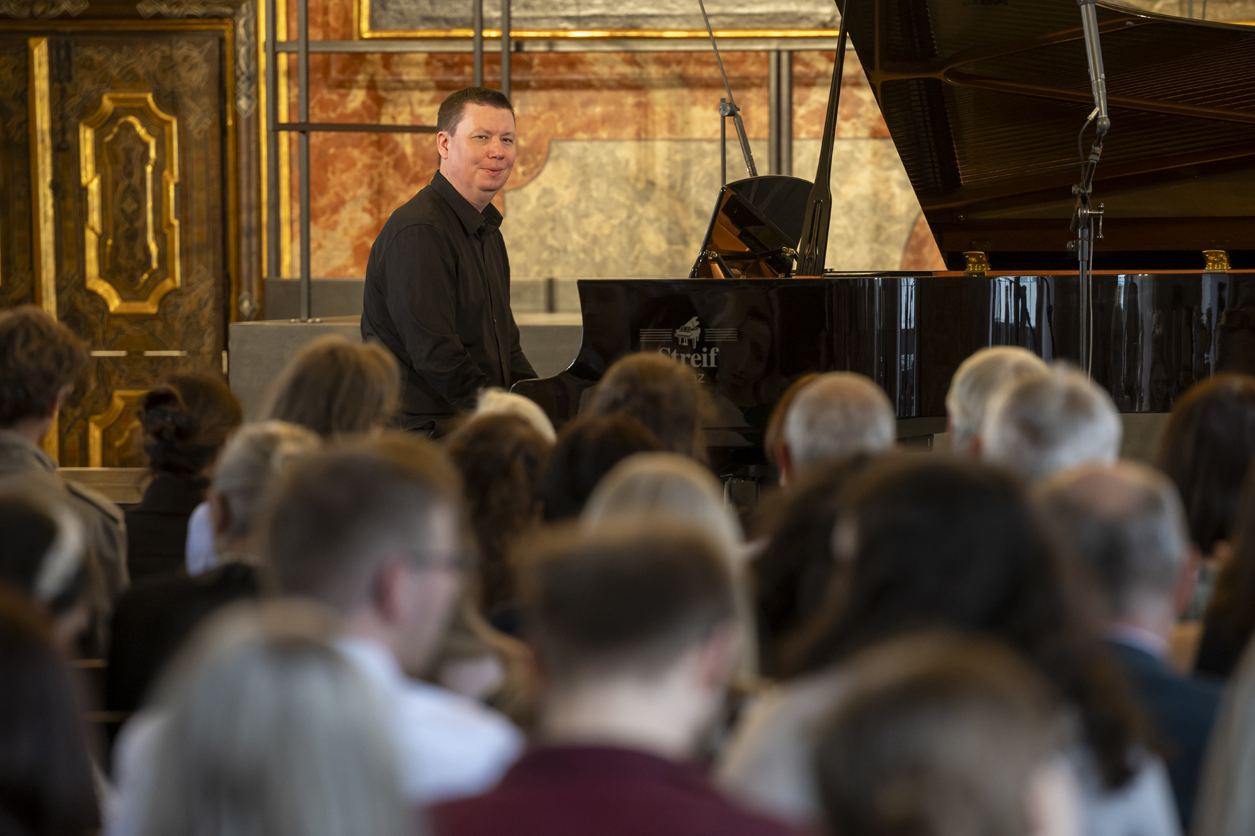 Norwegian composer Ola Gjeilo improvising during his solo concert, Voices of Spirit 2024, Graz