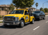 Towing Eastvale wheel lift towing service safely towing an SUV along a residential street for reliable vehicle recovery