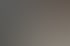 Zwei Männer arbeiten an einem Computer, einer zeigt auf den Bildschirm.