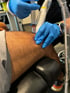 A medical professional gives a prp injection into a patient's leg.