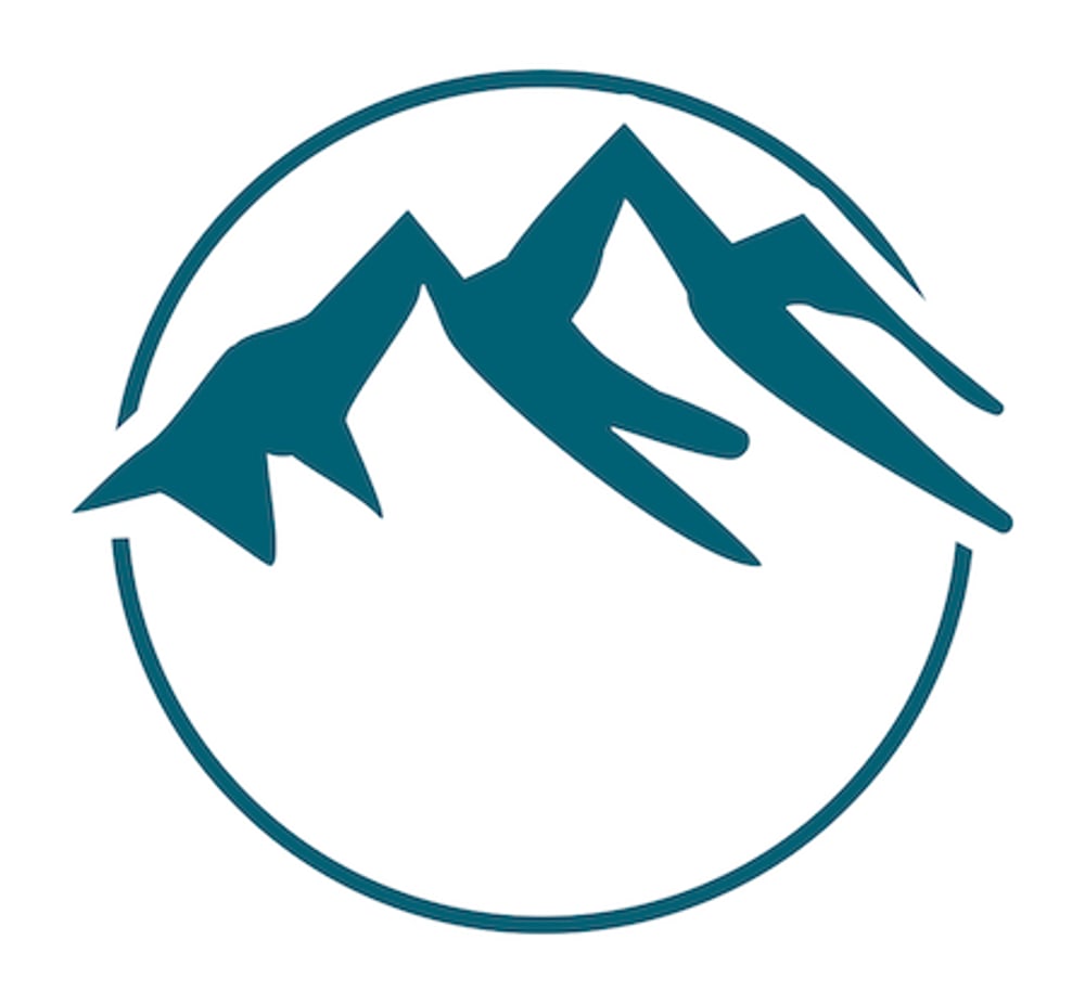 Dunkelblaue Bergumrisse in einem Kreis auf weißem Hintergrund.