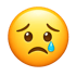 Ein gelbes, trauriges Emoji mit gesenkten Augenbrauen und einem blauen Tropfen unter dem rechten Auge.