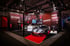 CREW10-Messestand in der Premiumhalle der OMR 2025 mit firmeneigenem Lamborghini und NOVUS Lightbike