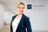 Porträtfoto von Lucie Lotzkat Geschäftsführerin VON POLL FINANCE