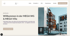 Startseite einer Website mit dem Titel "Willkommen in der MEGA WG & MEGA Villa" und einem modernen Gebäude.