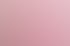 Vier Frauen in pinkfarbenen Poloshirts und weißen Hosen stehen nebeneinander und lächeln.
