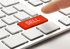 Onlinekurs verkaufen: Symbolbild mit roter „SELL“-Taste auf Tastatur – Start in den digitalen Vertrieb