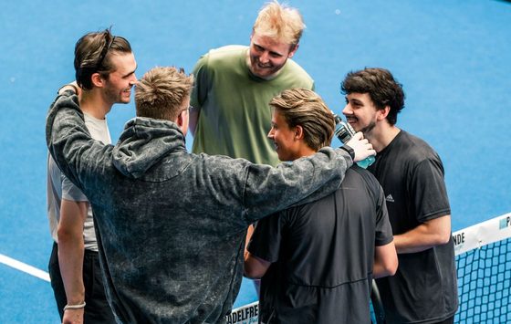 Team talk on the padel court