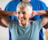 Older woman stretches neck with physical therapist for pain relief