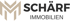 Logo mit zwei beigefarbenen "M"-Buchstaben und dem Text "SCHÄRF IMMOBILIEN" in Schwarz.
