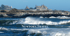 Waves crash against a rocky shore with a large stone mansion on a distant hill under a clear blue sky. Newport.Travel.