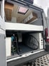 Genutzter Stauraum im Teilausbau mit Surfbrett