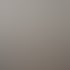 Modernes Wohnzimmer mit brennendem Design-Kamin, hellem Parkettboden, weißem Sessel und Couchtisch.