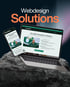 Laptop und Smartphone mit der Webseite "Haveldoc", oben steht "Webdesign Solutions".