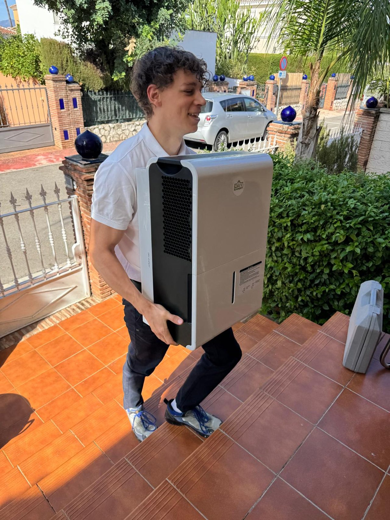 DAMP-EXPERT delivering a dehumidifier to a property on the Costa del Sol