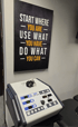 Motivational signs above a medical therapy device.