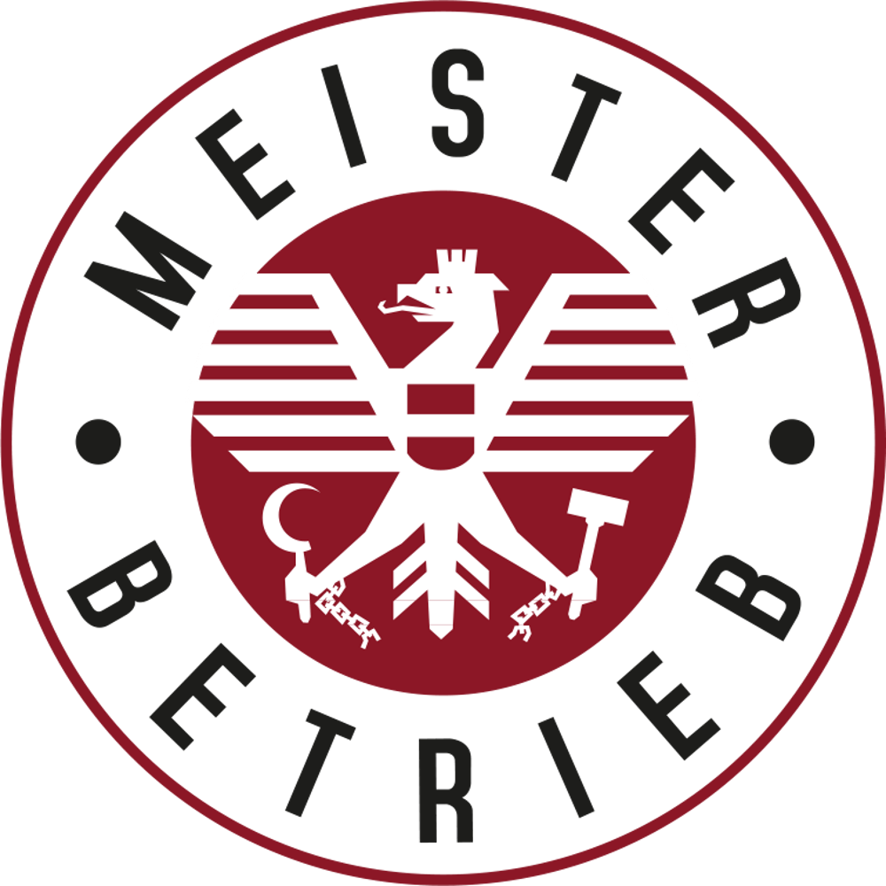 Rotes und grünes rundes Logo mit Text „MEISTER BETRIEB“ und einem weißen Adler, der einen Hammer und eine Sichel hält.