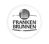 Rundes Logo von Franken Brunnen in Schwarz-Weiß mit einem Punkt-Symbol über dem Markennamen.