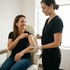 Smiling patient receiving ozone therapy injection treatment.