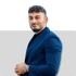 Hamed Abaszada Geschäftsführer der Firma Immoanfrage (Immo anfrage) aus Hamburg, hier trägt er ein blauen Nadelstreifen Anzug, 