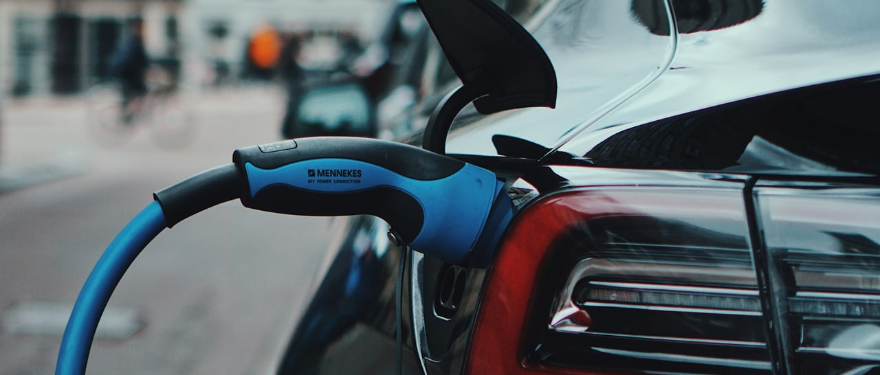 EV charging cable connected to an electric car