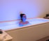 Woman in ice bath, experiencing Kaqun oxygen therapy.