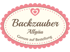 Rosa-weißes ovales Logo mit gezacktem Rand, Schriftzug "Backzauber Allgäu Genuss auf Bestellung" und einem Herz.