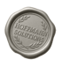 Silbergraues Wachssiegel mit dem Text "HOFFMANN SOLUTIONS" und einem Lorbeerkranz.
