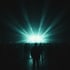 Silhouetted crowd facing a stage with cyan light beams fanning overhead