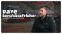 Dave, Berufskraftfahrer, Mitarbeiter im Interview. Mann mit Bart vor LKW und Lader.