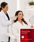 Trained aesthetics clinician administers a cosmetic facial injection to a woman