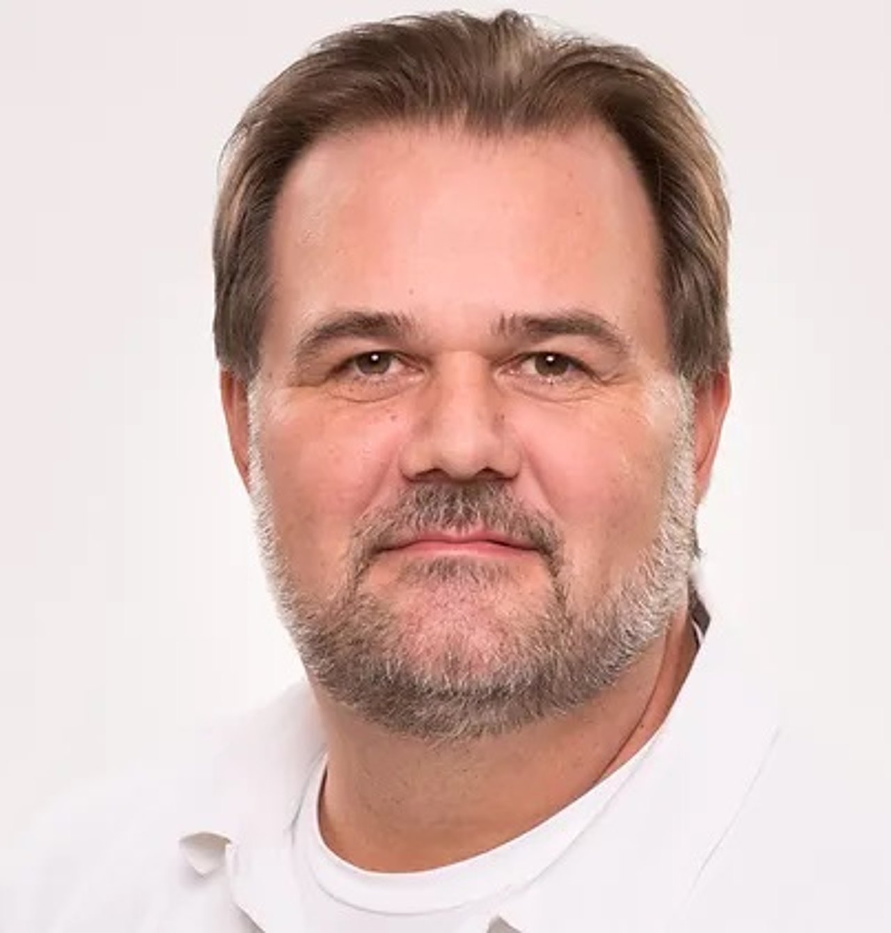 Dr. Harald Scheja
