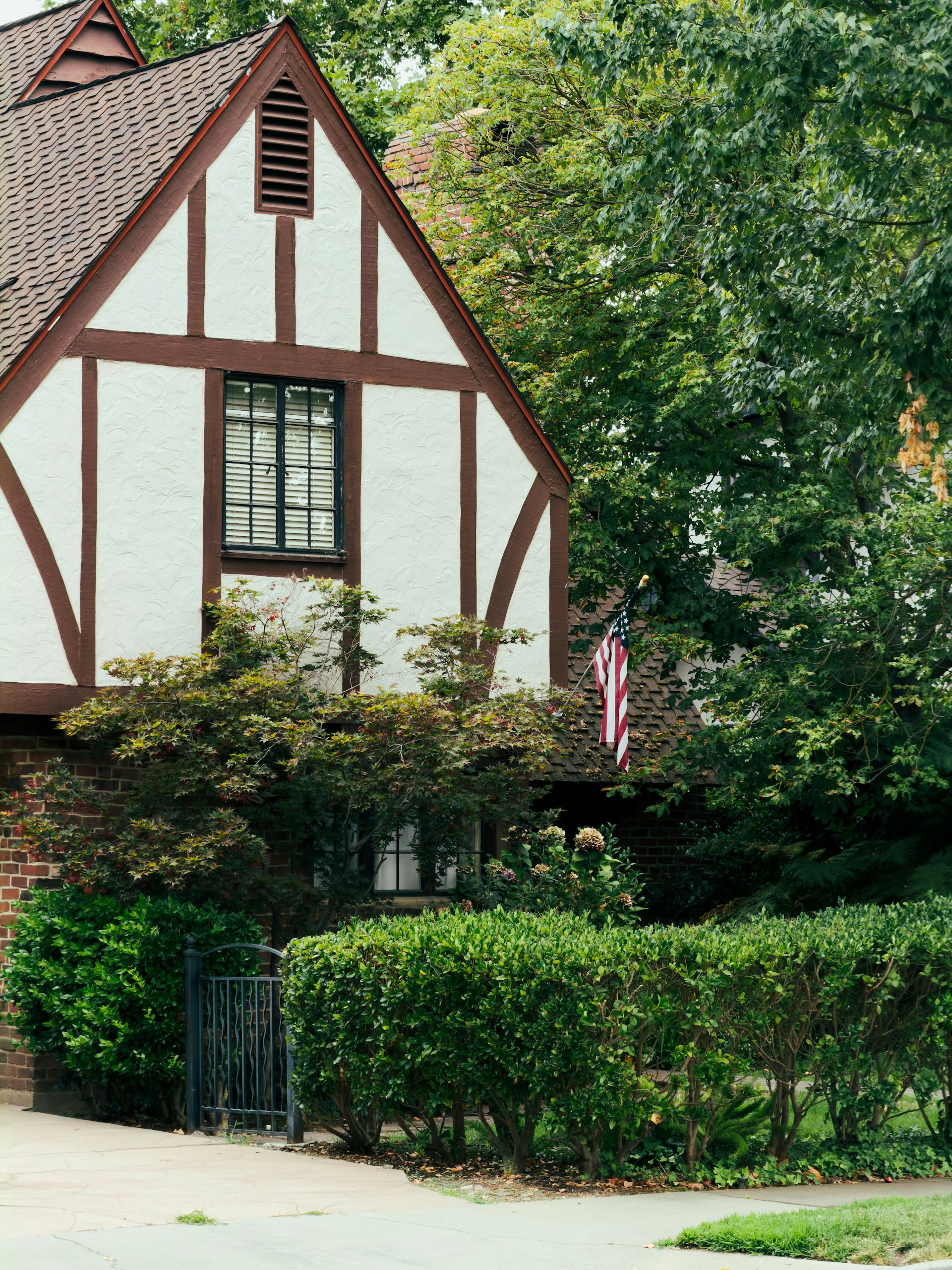The facade of a San Mateo home protected by a monitored security system
