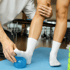 Physical therapist assisting a patient with rehabilitation.