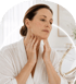 A woman checking the loose skin on her neck