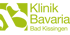 Logo der Klinik Bavaria Bad Kissingen in Hellgrün auf dunklem Hintergrund.